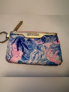 Lilly Pulitzer Pink with Light Blue ID pouch.